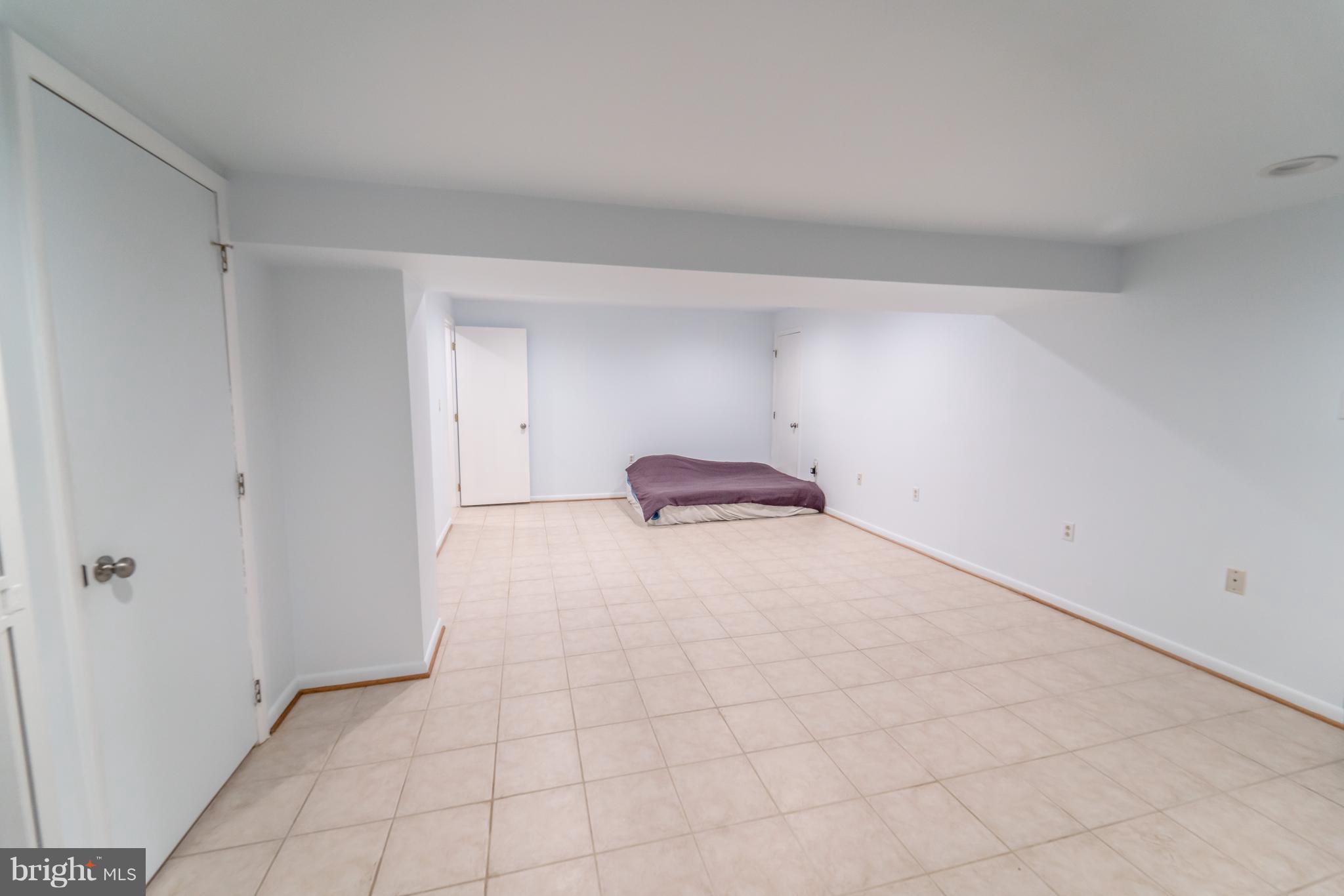 14903 Hatteras Way Silver Spring, MD 20906 - Photo 21 of 30 Huge fully finished rec room in basement!
