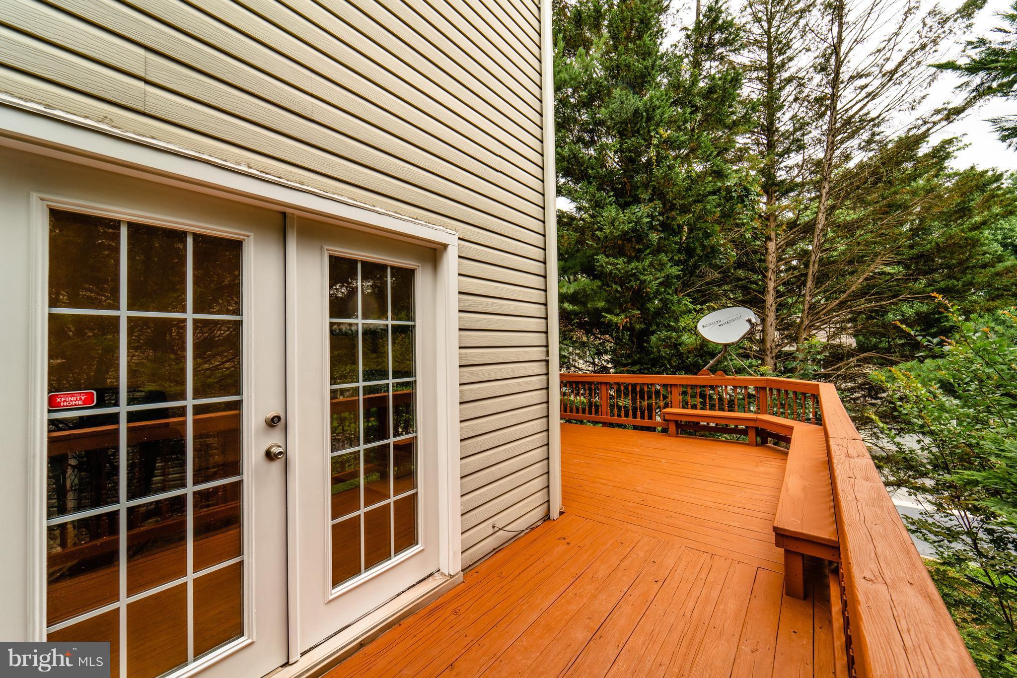 14903 Hatteras Way Silver Spring, MD 20906 - Photo 25 of 30 Wrap around deck with built-in seating!