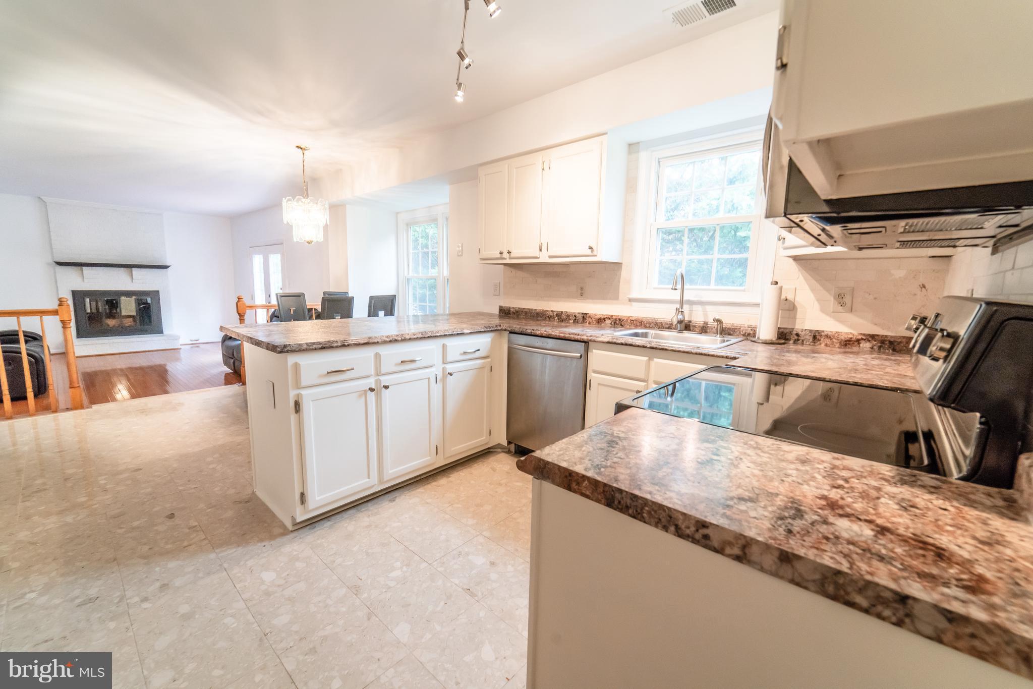 14903 Hatteras Way Silver Spring, MD 20906 - Photo 6 of 30 Kitchen opens to family room for easy entertaining
