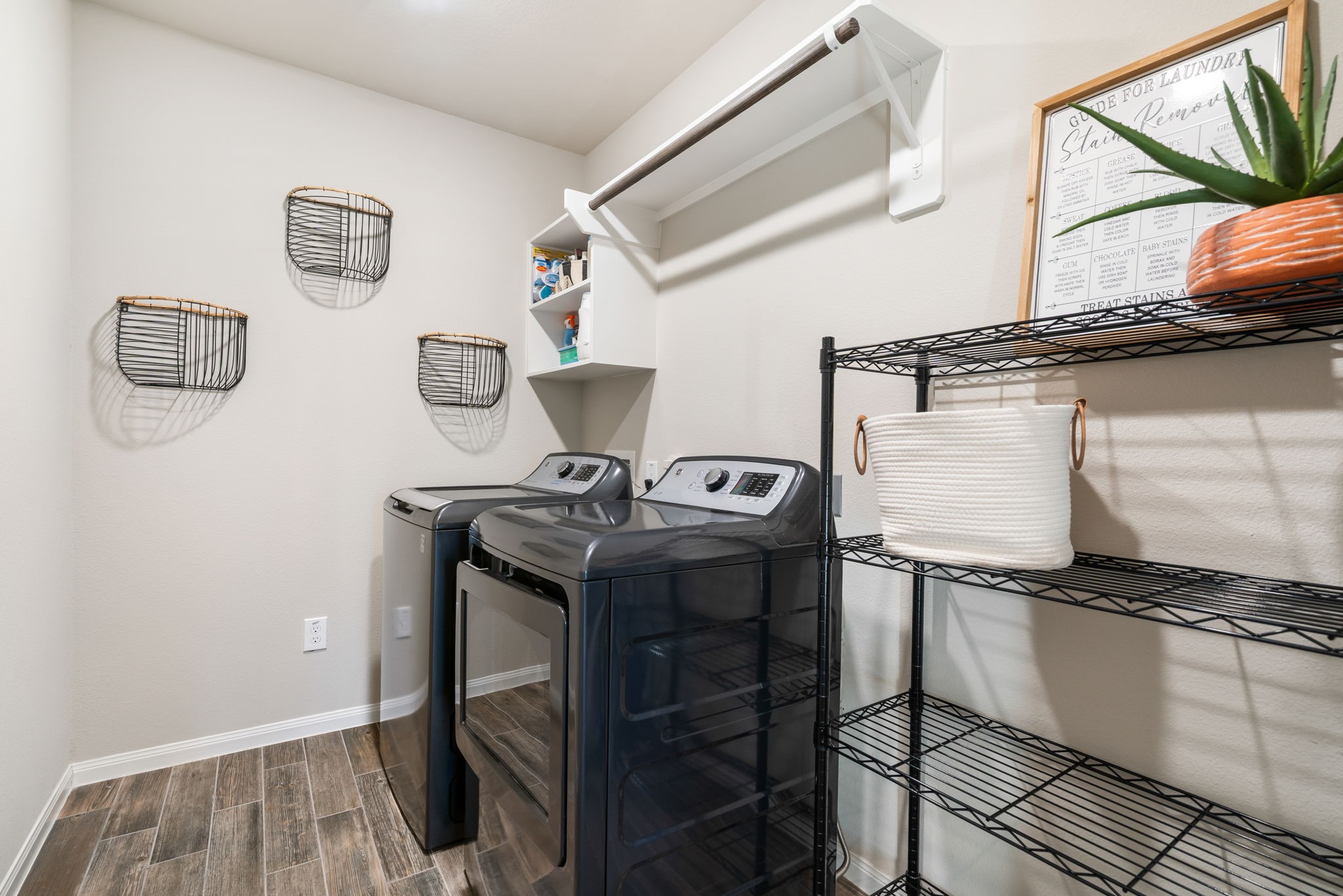 17525 Sunset Skies Road Conroe, TX 77302 - Photo 28 of 50 The Utility Area of this home is extensive. Cleaning Closet, Central Vac, a generous Laundry Room, and 3 car Garage.