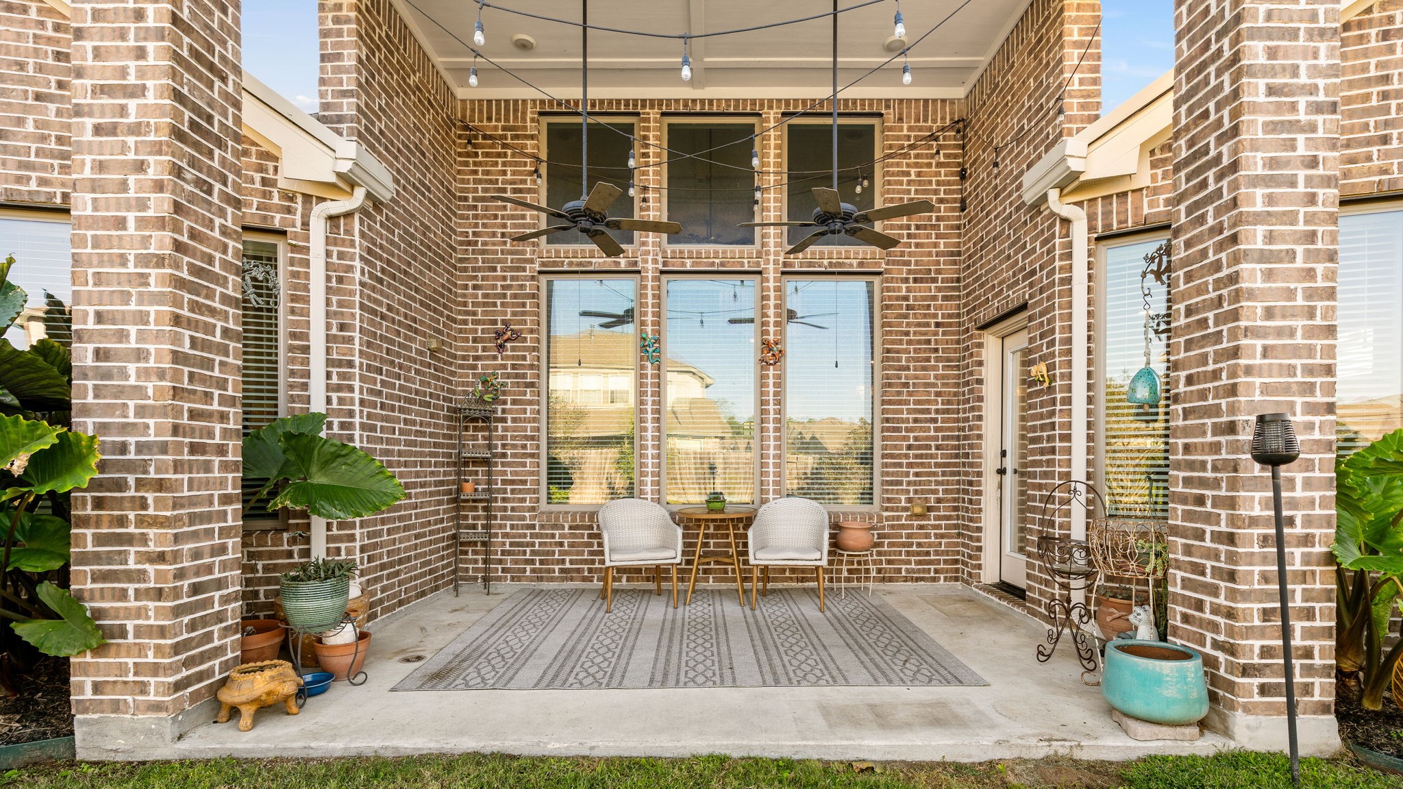 17525 Sunset Skies Road Conroe, TX 77302 - Photo 37 of 50 The Stately Extended Covered Patio provides lots of space and shade for outdoor entertaining, or relaxing!