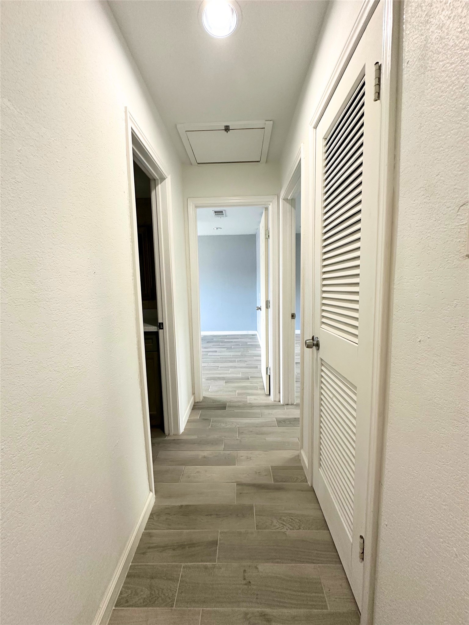 8332 La Roche Lane Houston, TX 77036 - Photo 8 of 15 Hallway to Primary Bedrooms and Hollywood Bath 2nd Floor