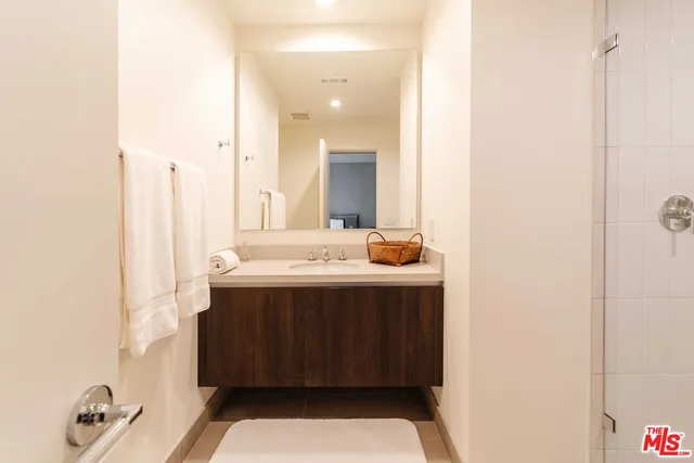 a utility room with sink dryer and washer
