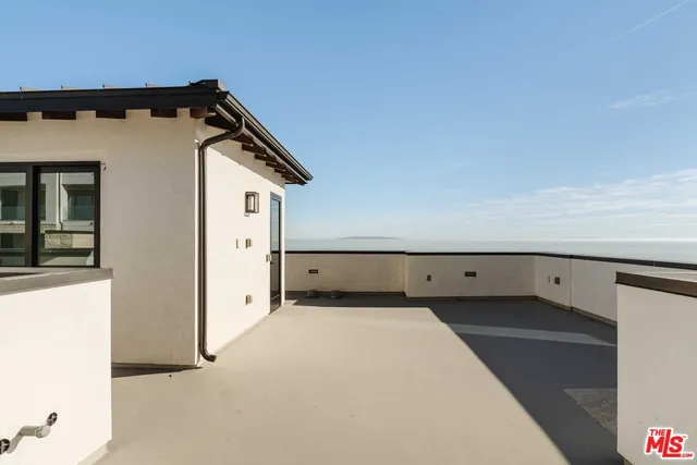 a view of a city and ocean view