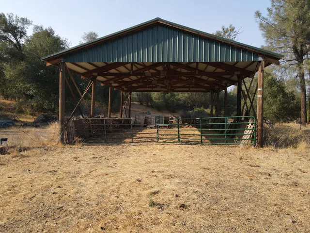 a view of lake with trees in the back