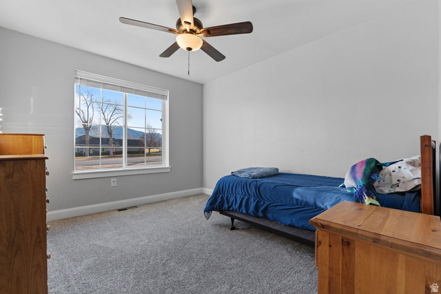 75 North 100th Street West Fillmore, UT 84631 - Photo 24 of 62 Carpeted bedroom with ceiling fan and a mountain view