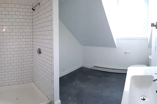 a bathroom with a sink and toilet