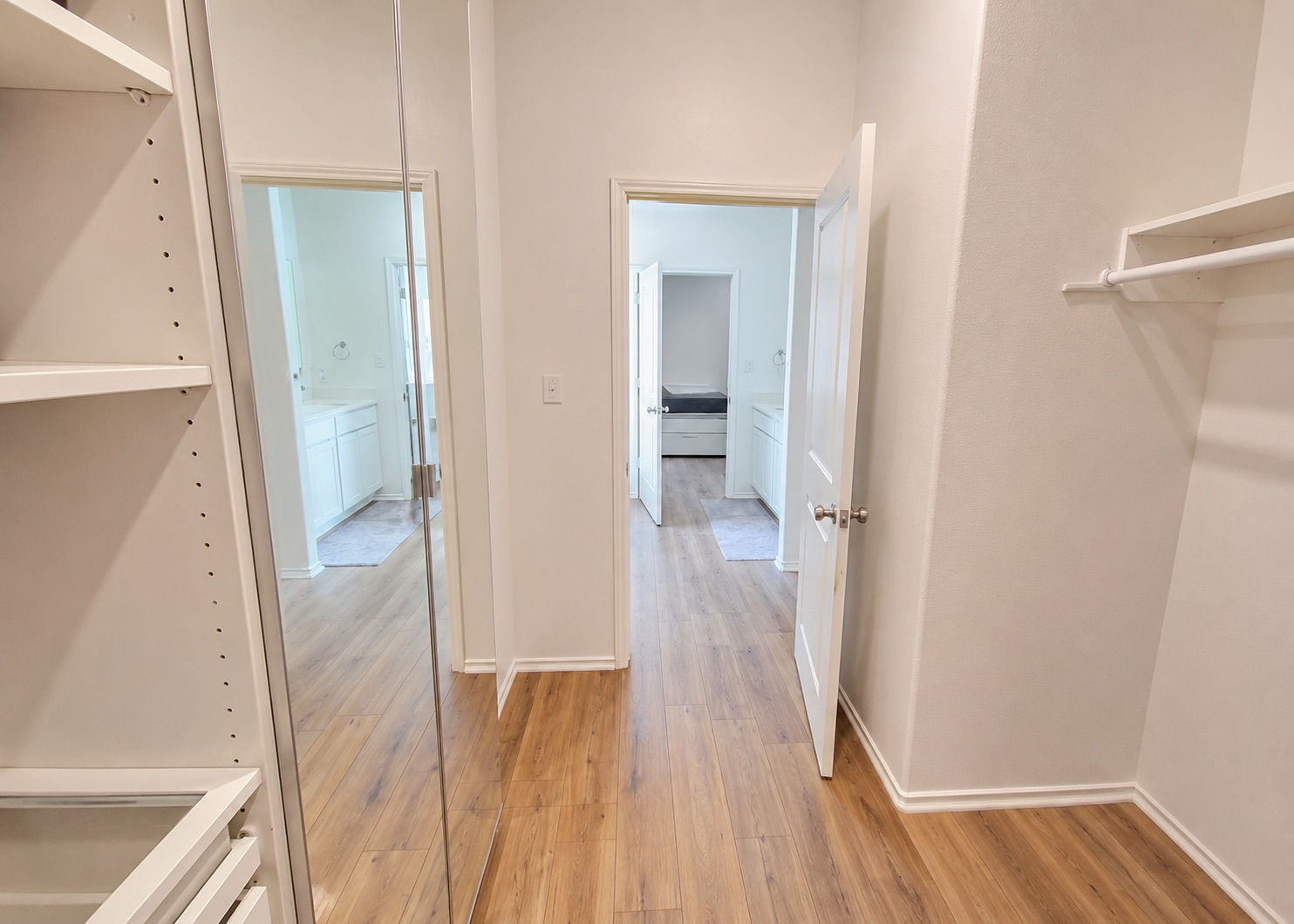 208 Wolf Springs Road Georgetown, TX 78628 - Photo 18 of 32 Walk-in closet offering thoughtful organization and seamless access to private en-suites.