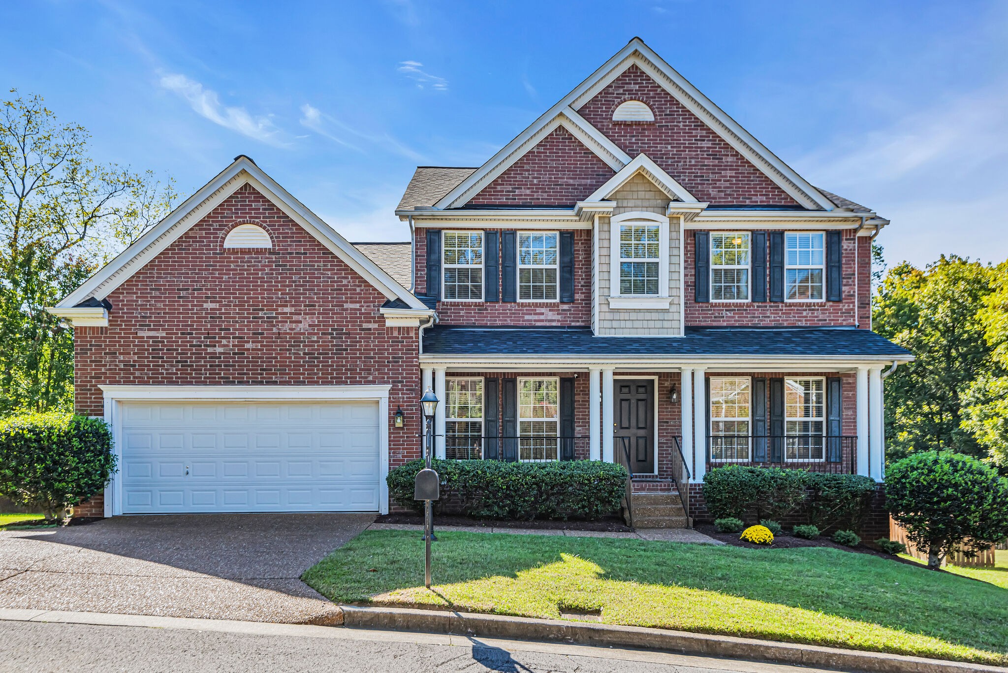 1013 Heathfield Circle Brentwood, TN 37027 - Photo 1 of 29 a front view of a house with garden