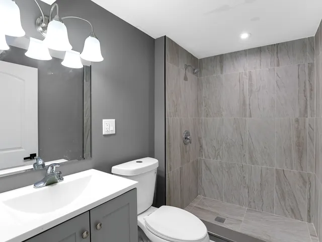 a view of balcony with furniture