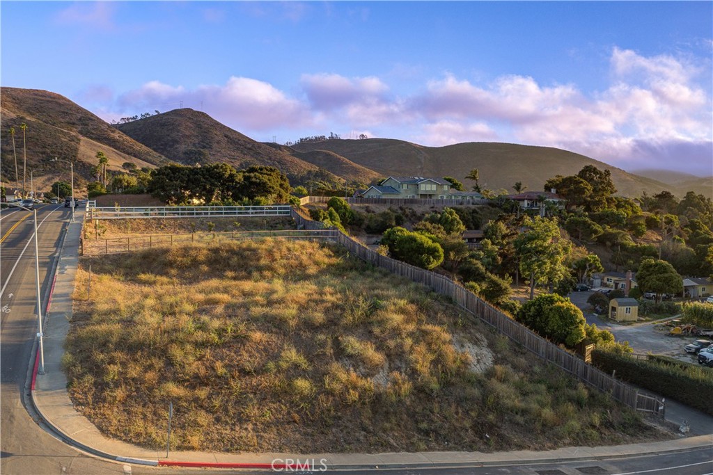 209 South 7th Street Lompoc, CA 93436 - Photo 6 of 10 a view of a lake with a mountain in the background