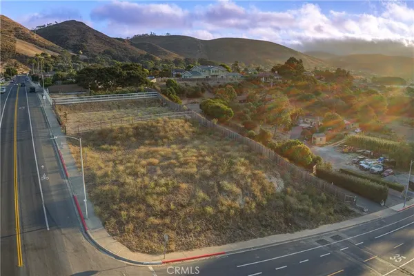 a view of a yard from a balcony