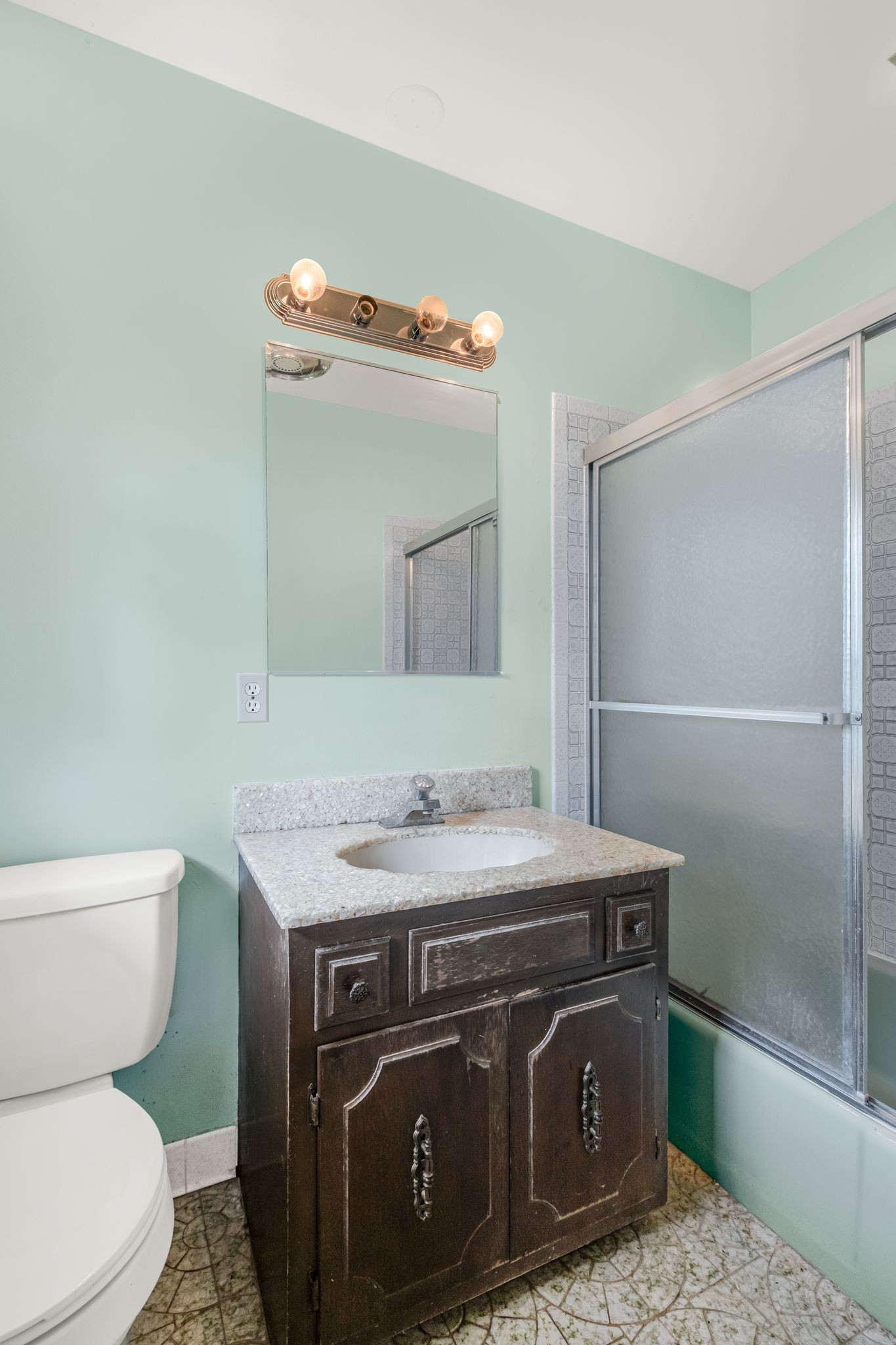 4245 Nonaville Road Mount Juliet, TN 37122 - Photo 28 of 38 a bathroom with a sink a toilet and a mirror