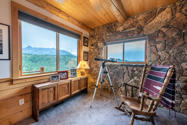 a view of an empty room with stairs
