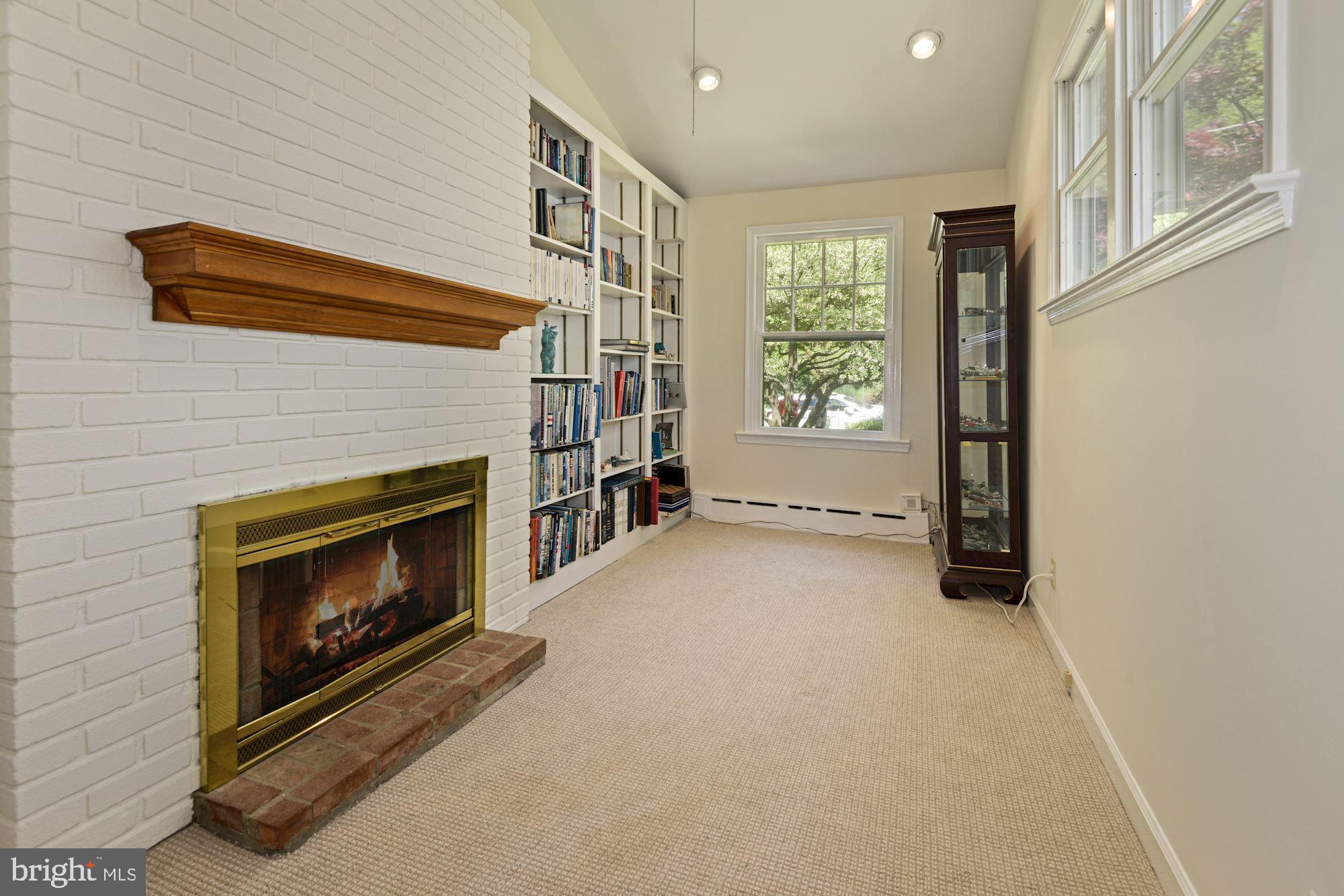5918 Broad Branch Road Northwest Washington, DC 20015 - Photo 11 of 44 Library or Home Office w Built-ins, 2 side gas fpl