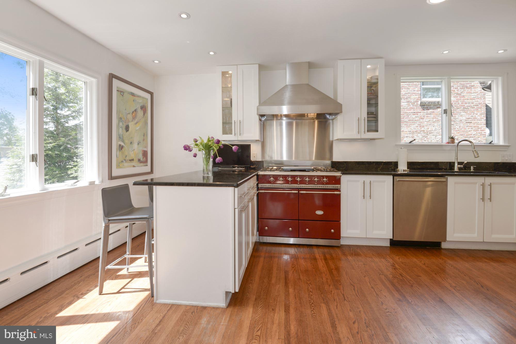 5918 Broad Branch Road Northwest Washington, DC 20015 - Photo 14 of 44 Kitchen w/Breakfast Bar, Natural Light Streaming