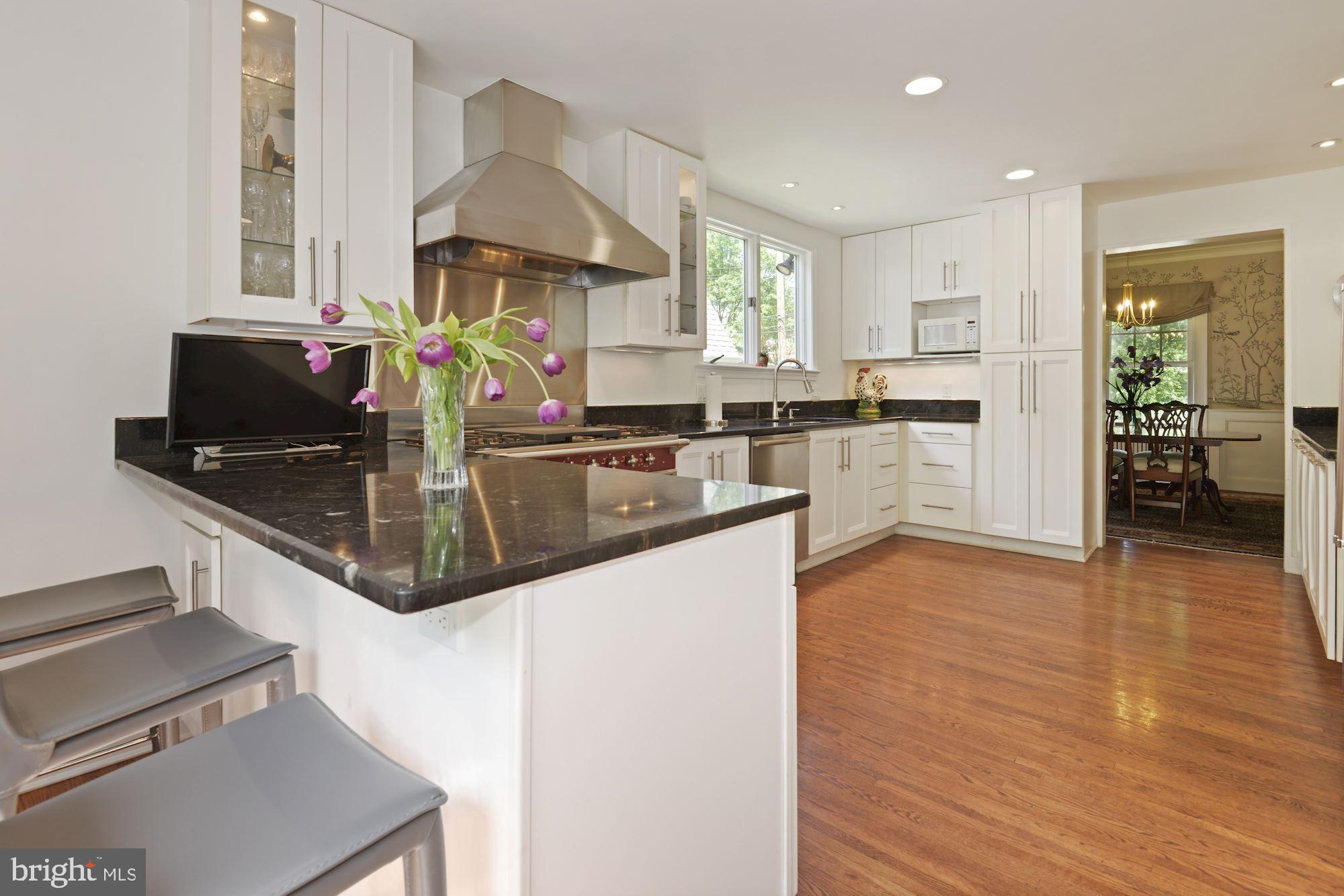 5918 Broad Branch Road Northwest Washington, DC 20015 - Photo 15 of 44 Kitchen w/Breakfast Bar w/peak at DNG
