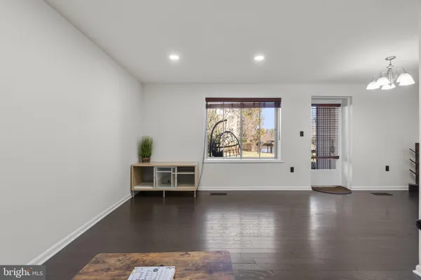 a view of a living room and dining room