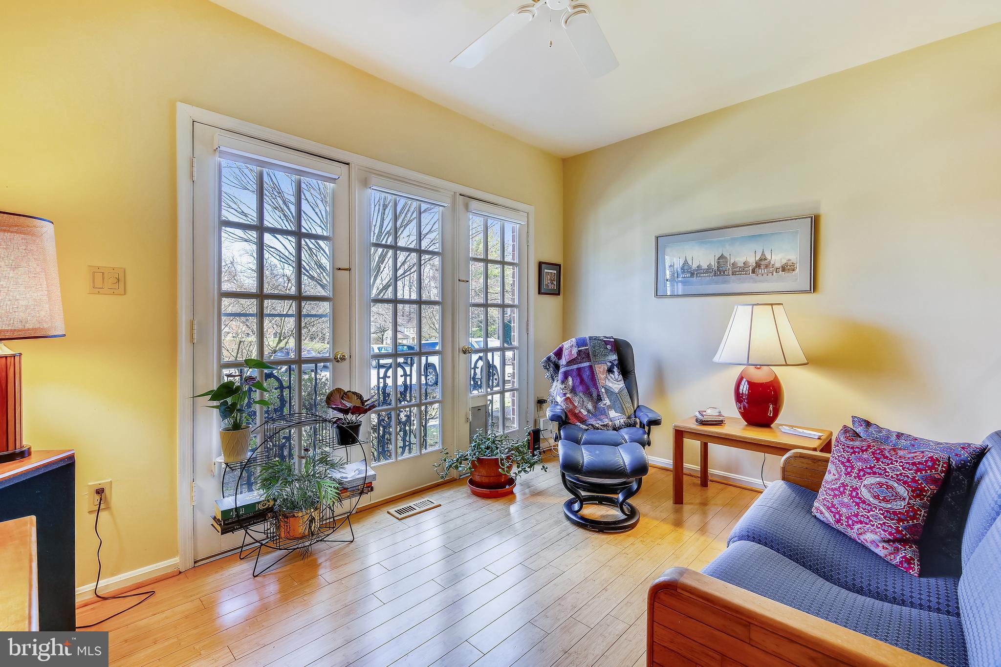 7234 Greentree Road Bethesda, MD 20817 - Photo 14 of 29 Cozy family room off kitchen. Bamboo floors.