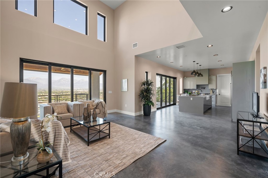 2380 Scenic Ridge Drive Chino Hills, CA 91709 - Photo 15 of 64 a living room with furniture large window and wooden floor