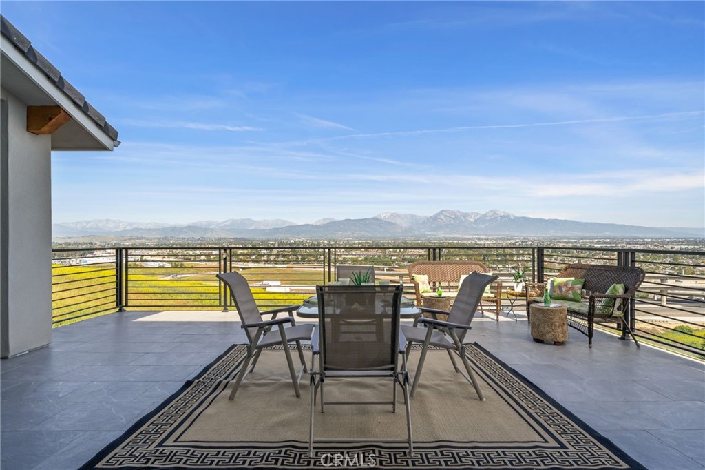 2380 Scenic Ridge Drive Chino Hills, CA 91709 - Photo 26 of 64 a view of swimming pool with outdoor seating and lake view