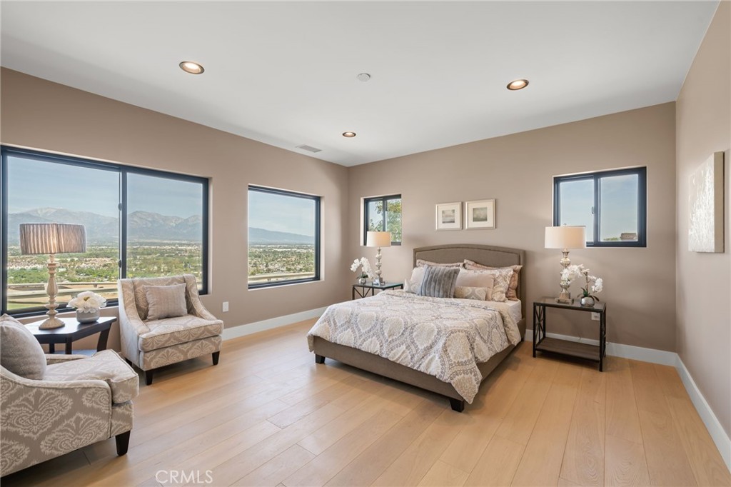 2380 Scenic Ridge Drive Chino Hills, CA 91709 - Photo 32 of 64 a spacious bedroom with a bed and a couch