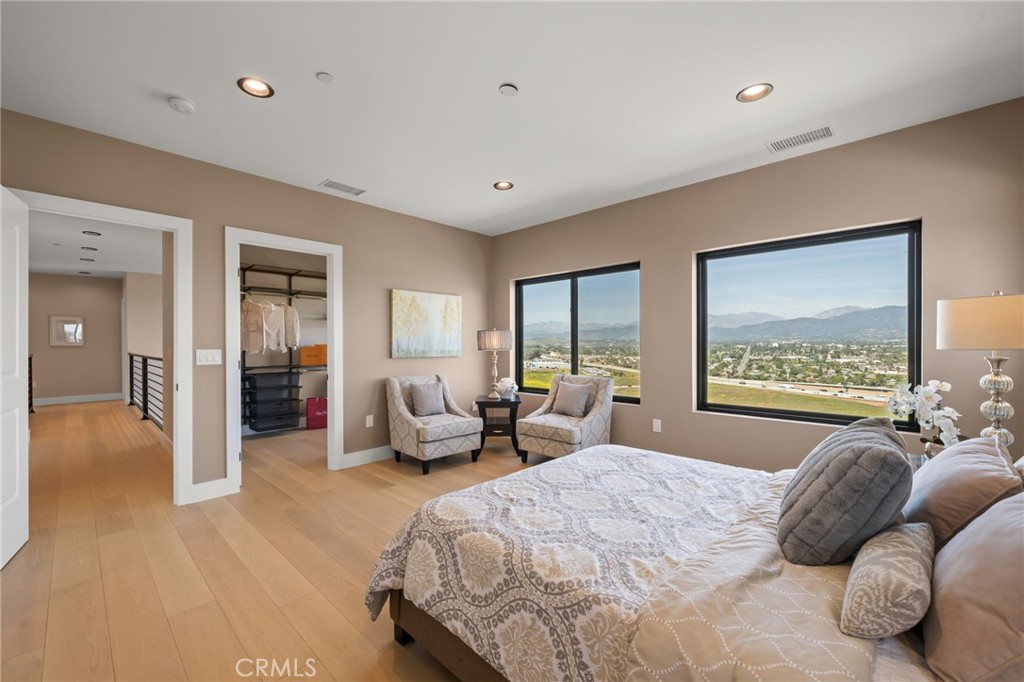 2380 Scenic Ridge Drive Chino Hills, CA 91709 - Photo 35 of 64 a bedroom with a large bed and a couch