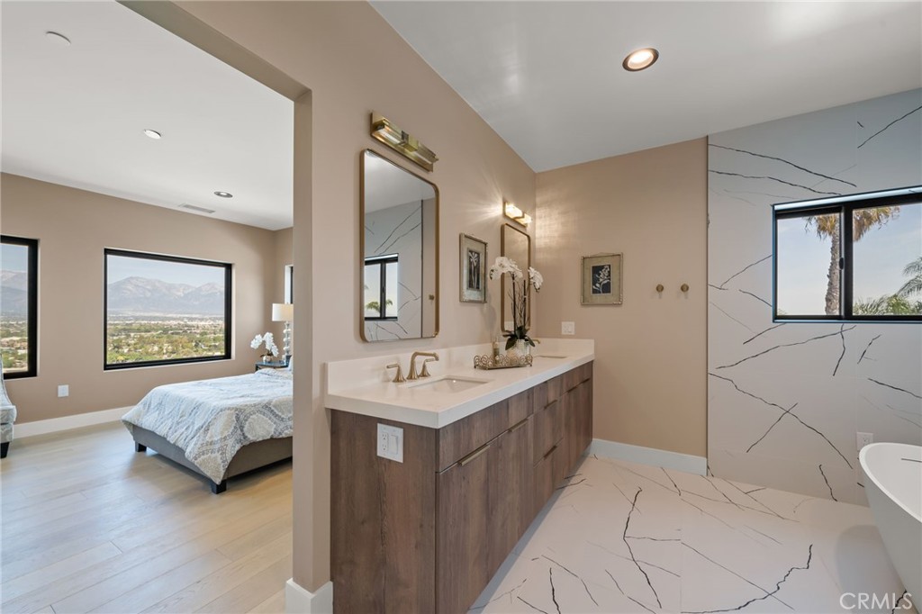 2380 Scenic Ridge Drive Chino Hills, CA 91709 - Photo 37 of 64 a en suite bathroom with a double vanity sink and a mirror