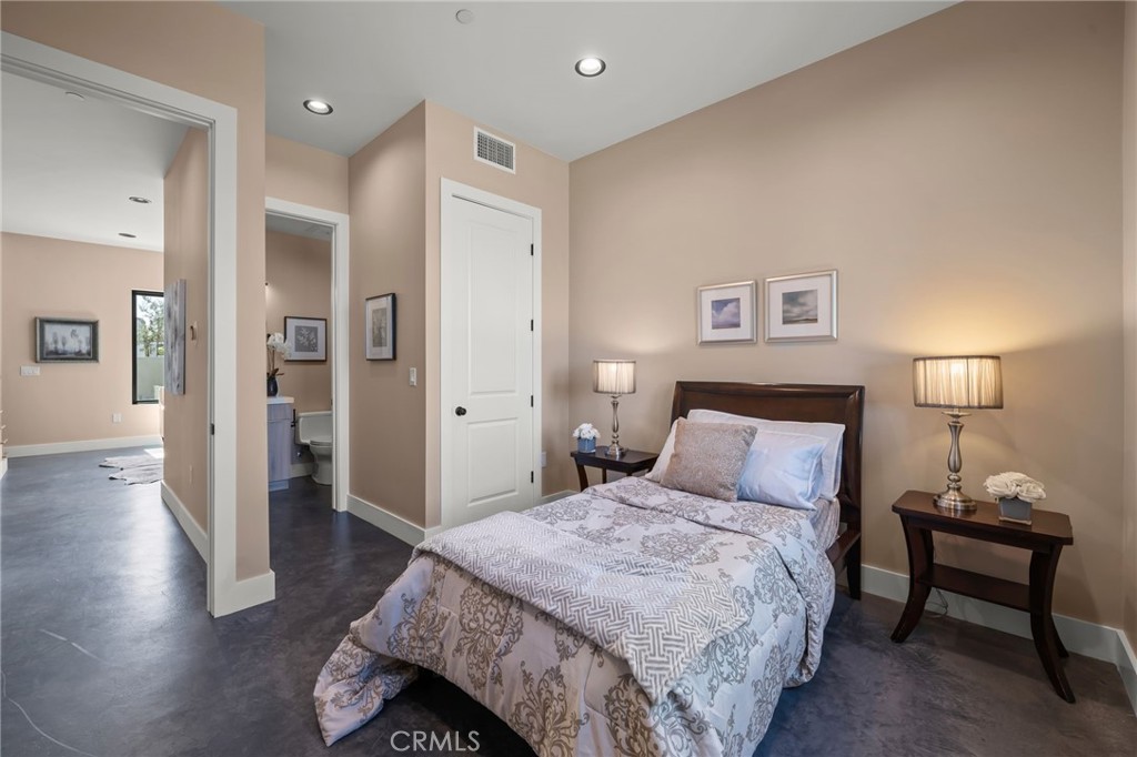 2380 Scenic Ridge Drive Chino Hills, CA 91709 - Photo 43 of 64 a bedroom with a bed and wooden floor