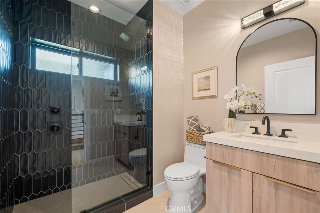 2380 Scenic Ridge Drive Chino Hills, CA 91709 - Photo 50 of 64 a bathroom with a sink a toilet and shower