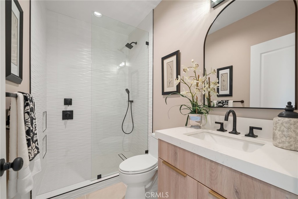 2380 Scenic Ridge Drive Chino Hills, CA 91709 - Photo 55 of 64 a bathroom with a granite countertop sink toilet and shower