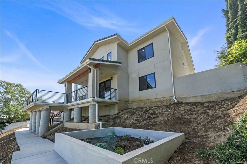 2380 Scenic Ridge Drive Chino Hills, CA 91709 - Photo 64 of 64 a front view of a house with plants
