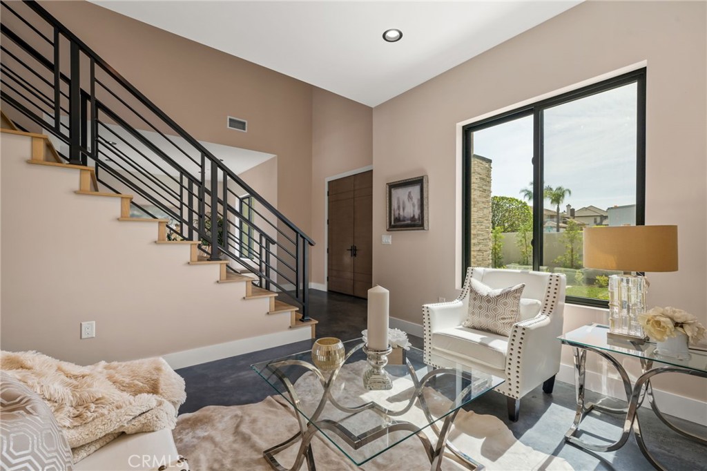 2380 Scenic Ridge Drive Chino Hills, CA 91709 - Photo 8 of 64 a living room with furniture and floor to ceiling windows