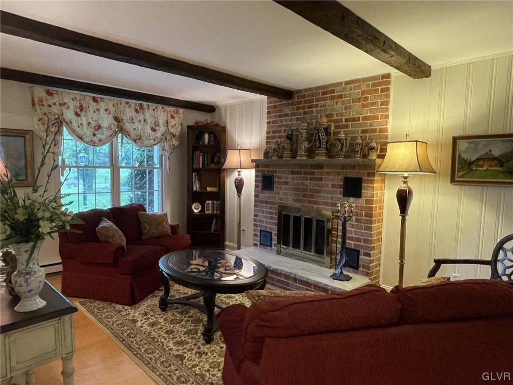 1145 Church Road Wind Gap, PA 18091 - Photo 14 of 24 a living room with furniture and a fireplace
