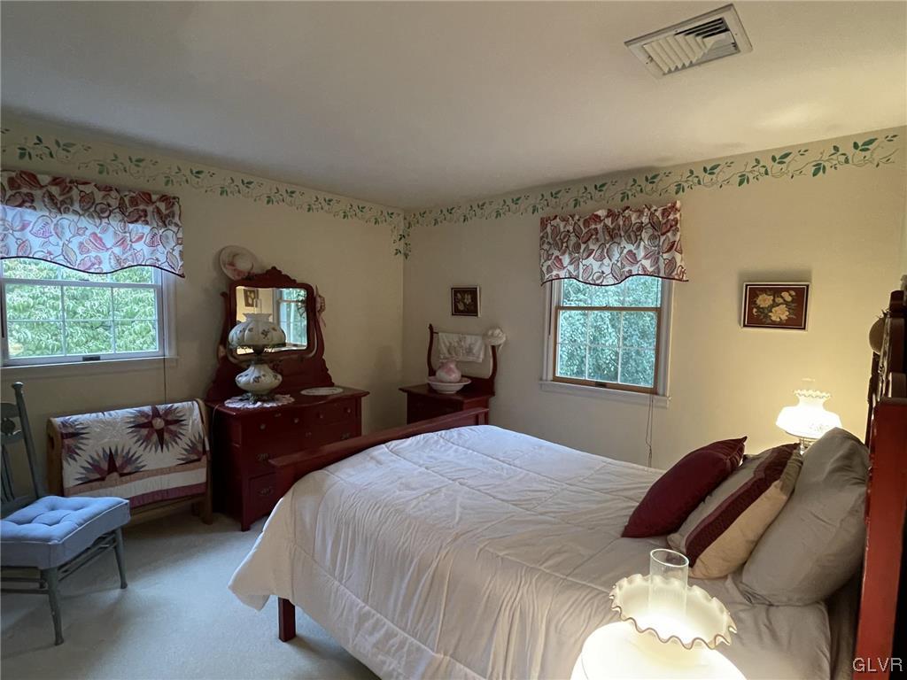 1145 Church Road Wind Gap, PA 18091 - Photo 20 of 24 a bedroom with bed window and couch