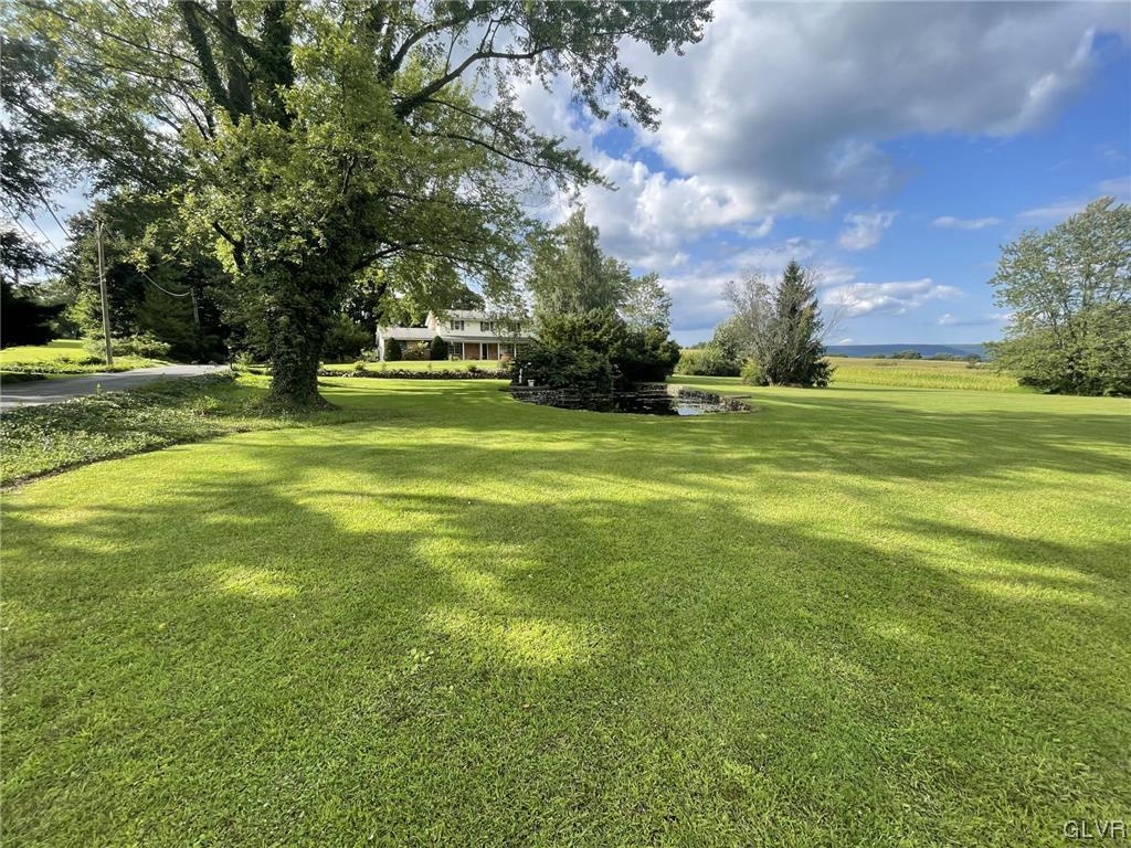 1145 Church Road Wind Gap, PA 18091 - Photo 2 of 24 a swimming pool with outdoor seating and yard