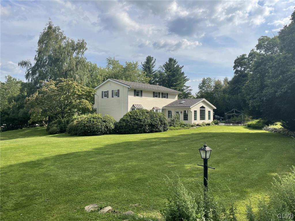 1145 Church Road Wind Gap, PA 18091 - Photo 4 of 24 a front view of a house with a yard