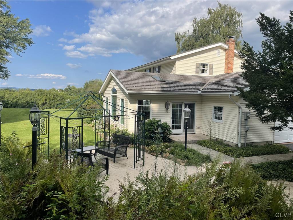 1145 Church Road Wind Gap, PA 18091 - Photo 5 of 24 a view of backyard of house with outdoor seating and green space