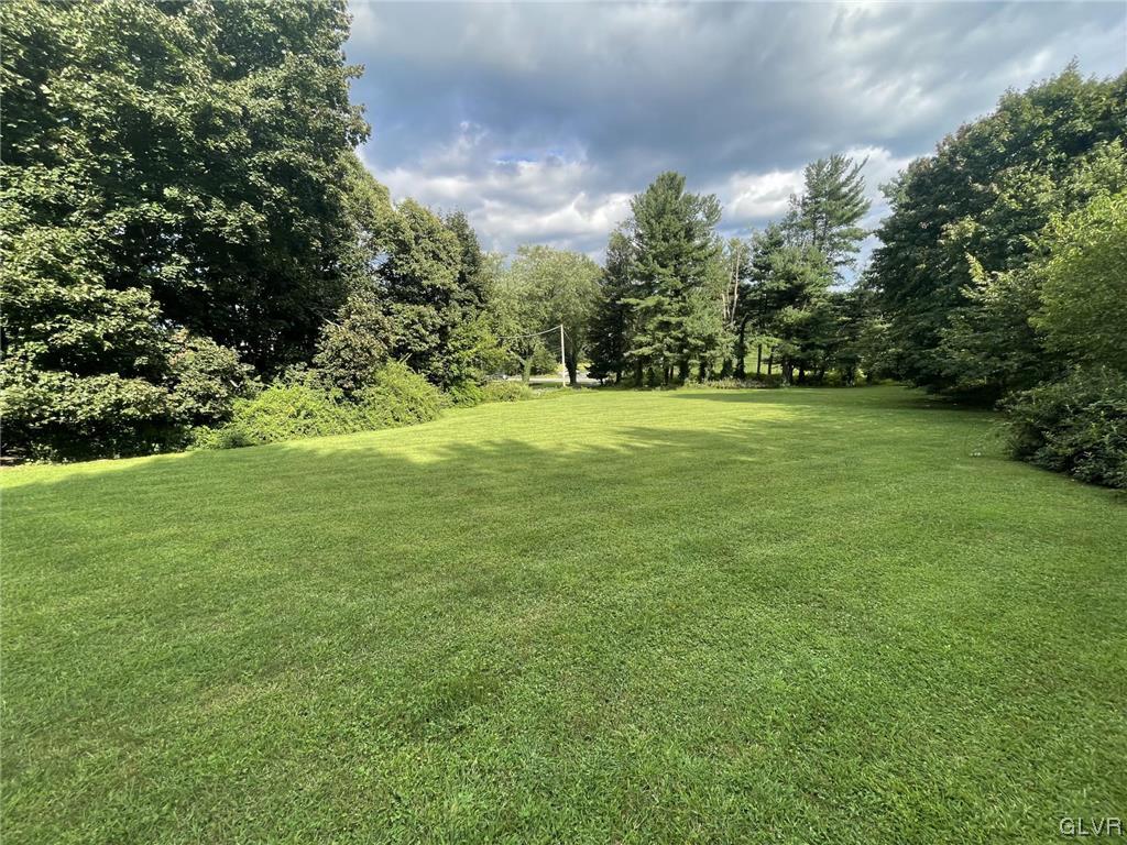 1145 Church Road Wind Gap, PA 18091 - Photo 7 of 24 a view of a grassy field with trees