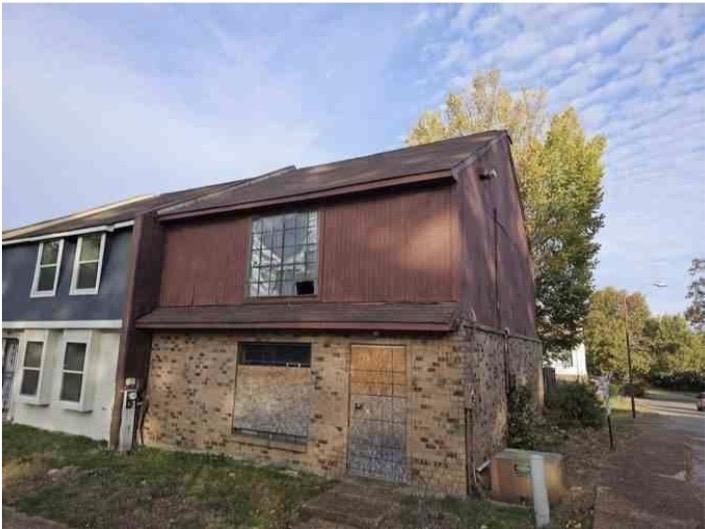 3640 Outland Road, Unit 92 Memphis, TN 38118 - Photo 1 of 1 Back of house featuring brick siding