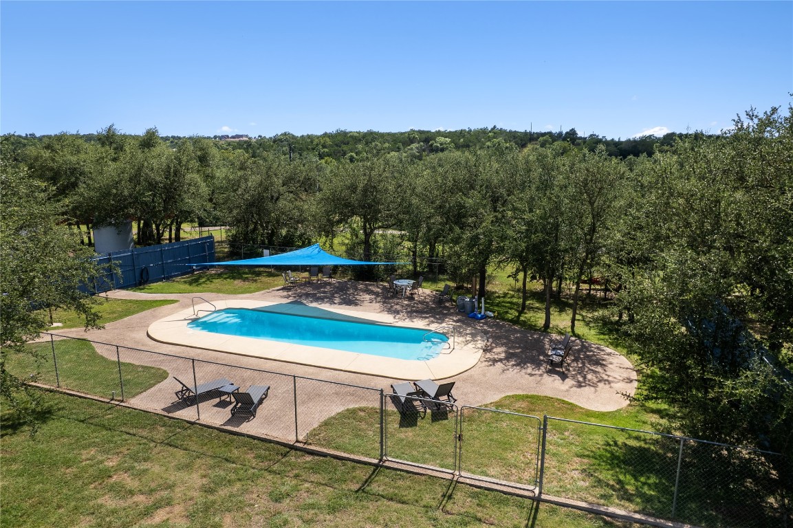 4032 Ranch Road 3232 Johnson City, TX 78636 - Photo 20 of 40 Swimming pool with large patio is a welcome relief on those warm Texas Summer days