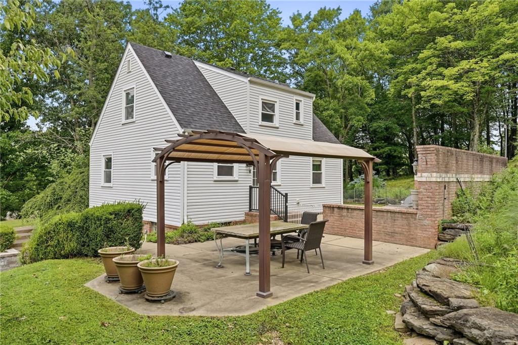 809 Franklin Road Mars, PA 16046 - Photo 37 of 44 Backyard patio and covered pergola dining area
