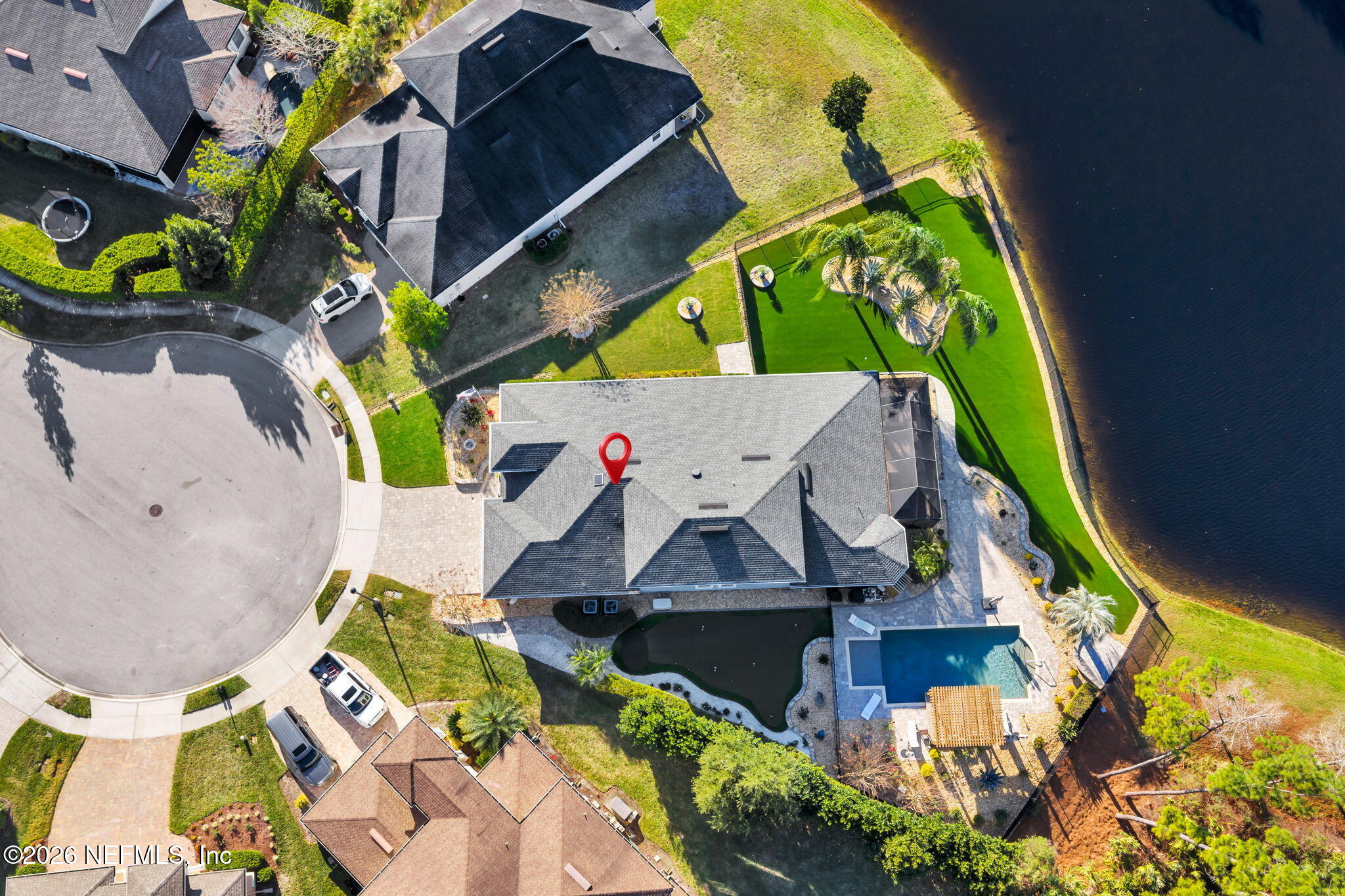 an aerial view of a house with a garden