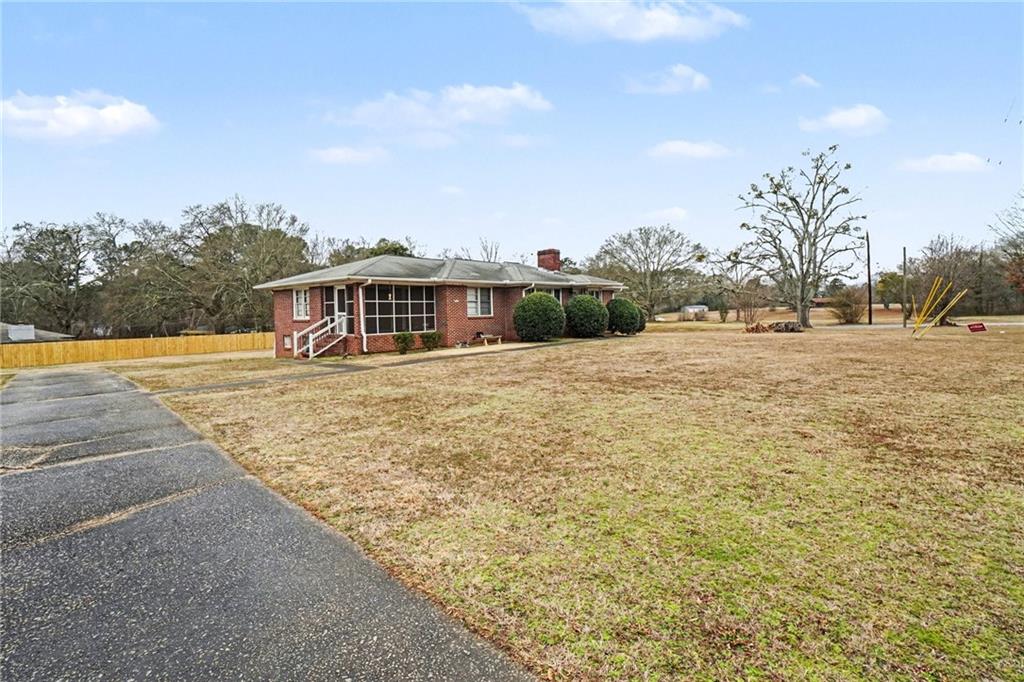 a view of house with outdoor space