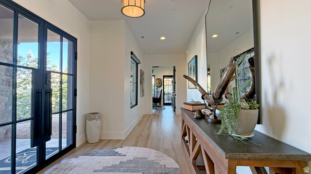 168 South Rancho Santa Fe Virgin, UT 84779 - Photo 8 of 58 Entryway featuring a large black-framed glass door, wood-finish flooring, recessed lighting, and a contemporary ceiling fixture