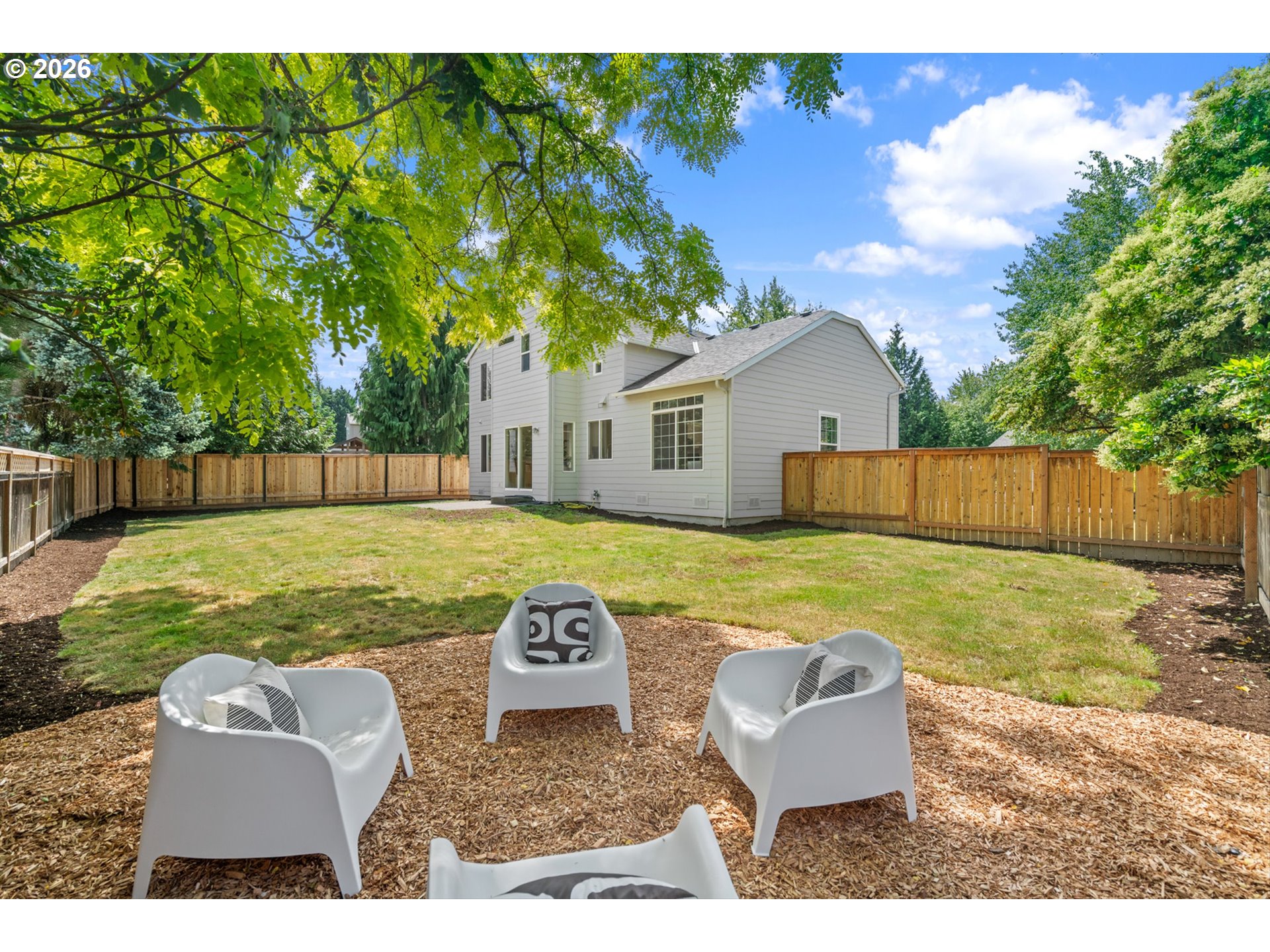 462 Southwest 211th Avenue Beaverton, OR 97006 - Photo 34 of 40 a view of house with backyard space and seating area