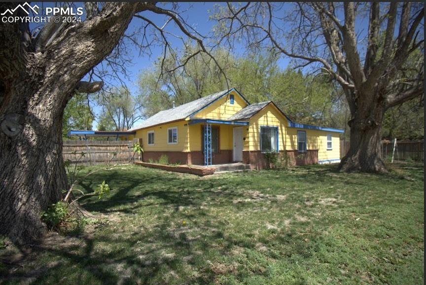 1015 Main Street Florence, CO 81226 - Photo 2 of 8 a view of a house with a yard