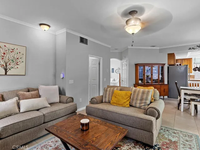 a living room with furniture and a couch