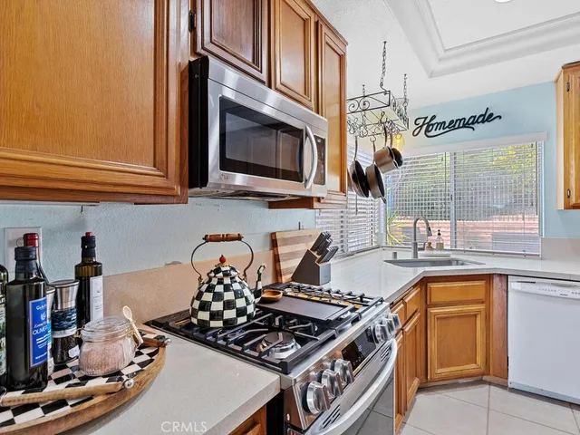 a kitchen with a stove and a microwave