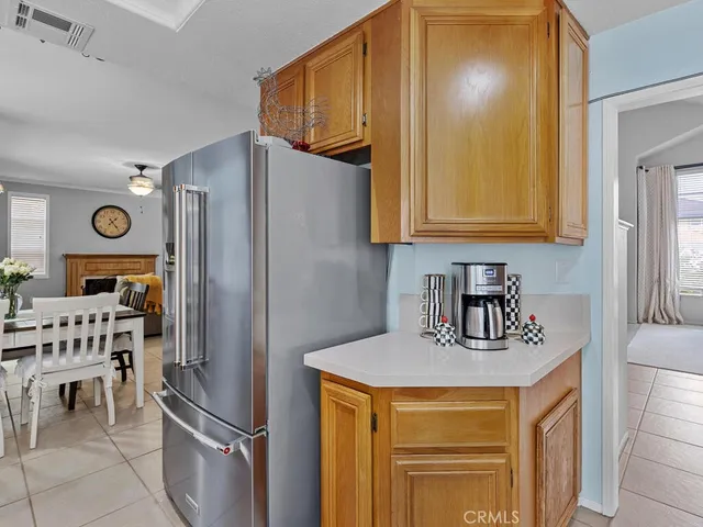 a kitchen with stainless steel appliances a refrigerator and a stove